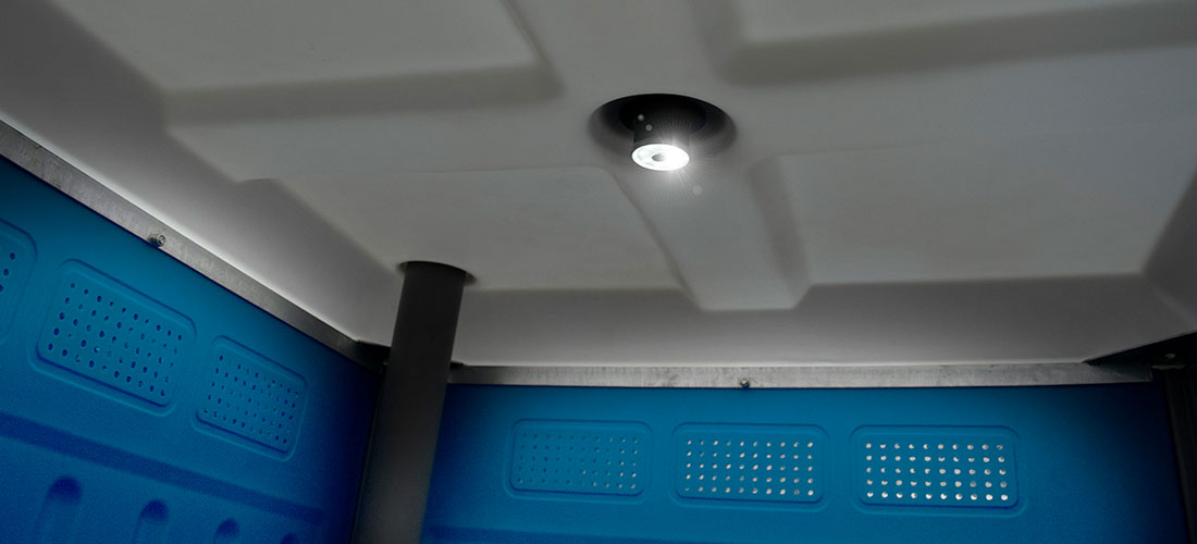 a-led-solar-light-on-the-ceiling-of-a-portable-toilet a led solar light on the ceiling of a portable toilet